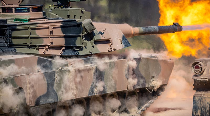 An Australian Army Abrams M1A2 SEPv3 main battle tank fires during a training serial as part of a soldier qualification course at Puckapunyal Military Area, Victoria. Photo by Corporal Jacob Joseph.
