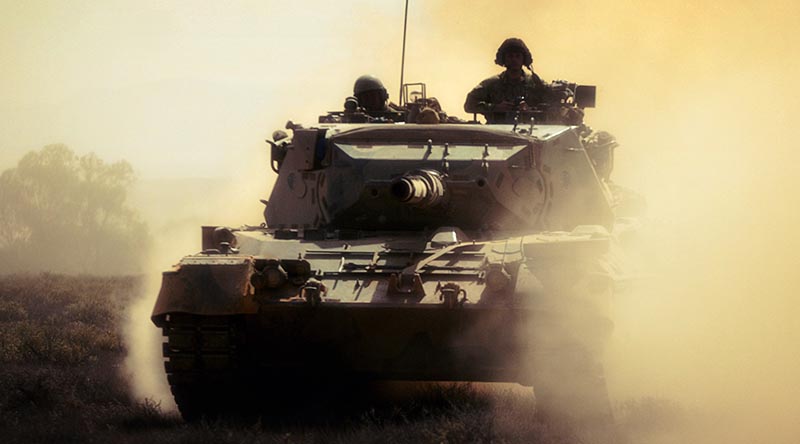 A Leopard tank from 1st Armoured Regiment conduct manoeuvres during Exercise Predators Strike at El Alamein Army Camp, Cultana, South Australia. Photo by Able Seaman Kade Rogers.