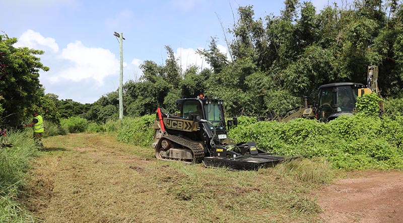 Army engineers from 6th Engineer Support Regiment clear the ground with a JCB Skid Steer Loader for the Army Ailan Community Assistance Program. Story and photos by Captain Joanne Leca.