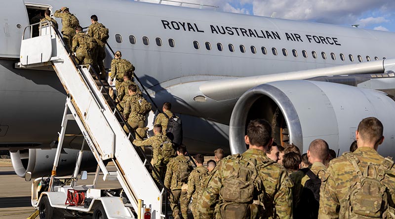 Australian Army Soldiers board a Royal Australian Air Force aircraft in support of Operation Beech, at RAAF Base Amberley, Queensland. Photo by Leading Aircraftman Campbell Latch.