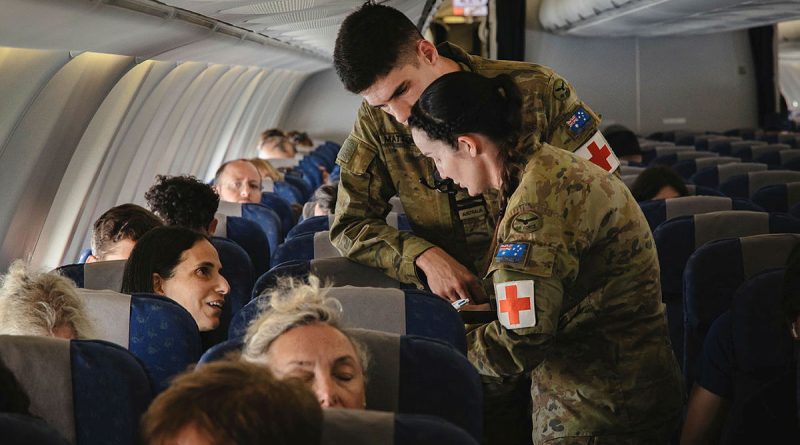 Australian Defence Force medical personnel provide assistance to Australian citizens on board a Royal Australian Air Force KC-30A aircraft during a military assisted departure from Tel Aviv, Israel, as part of Operation Beech. Story by Lieutenant Emily Tinker. Photos by Corporal Adam Abela.