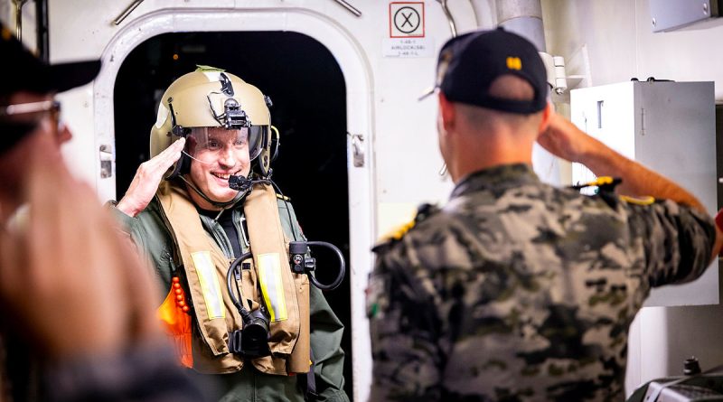 Commander United Kingdom Carrier Strike Group, Royal Navy Commodore James Blackmore is welcomed on board HMAS Sydney. Story by Lieutenant Hinako Shiraishi. Photo by Leading Seaman David Cox.