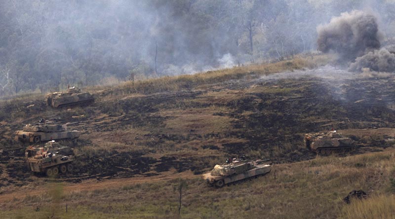 Mixed assets of 2nd Cavalry Regiment on Exercise Brolga Sprint at Townsville Field Training Area, Queensland. Photo by Corporal Caitlyn Davill.