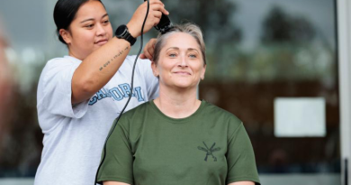 Executive Officer of 2 Security Forces Squadron, Squadron Leader Tai Kohn, has her head shaved after the squadron completed 3521 laps around the RAAF Base Amberley running track to raise funds to fight ovarian cancer. Story by Corporal Sam Price. Photos by Leading Aircraftwoman Taylor Anderson.