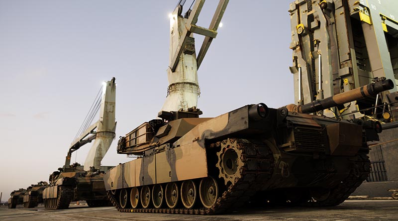 Australian Army M1A1 Abrams tanks await loading onto a ship in Australia, bound for Ukraine. Photo by Sergeant Tristan Kennedy.