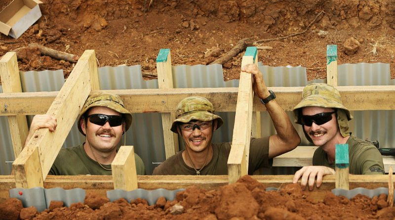 Trade apprentices, carpenter Sapper Jack Graham, electrician Aircraftman Erik Wegger and carpenter Sapper Samuel Meredith, from The School of Military Engineering, work on the underground Command Post for Exercise Talisman Sabre. Story and photos by Captain Joanne Leca.