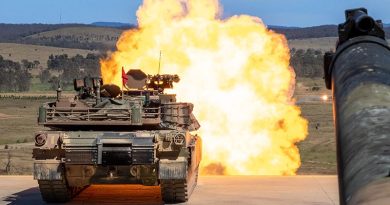 An Australian M1A2 SEP v3 main battle tank fires a sabot round during a live fire to confirm the aiming system of the tank at Puckapunyal Military Area, Victoria. Photo by Corporal Michael Currie.