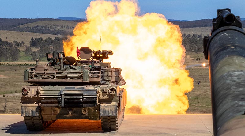 An Australian M1A2 SEP v3 main battle tank fires a sabot round during a live fire to confirm the aiming system of the tank at Puckapunyal Military Area, Victoria. Photo by Corporal Michael Currie.