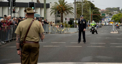 Major Anthony Bartlett is halted by Queensland Police Service Darling Downs District Officer, Superintendent Doug McDonald, for the ‘challenge’ during a freedom-of-entry march through Toowoomba. Story by Captain Cody Tsaousis. Photo by Private Alli Craig.