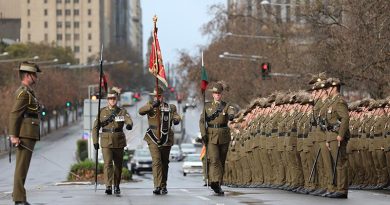 Soldiers of the 1st Armoured Regiment honour their unit's Standard in Adelaide. Photo by Private Sophie Hartley.