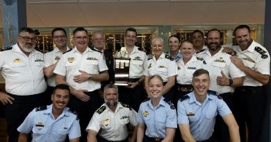 Pathfinder Association representative Jeff McClenaughan awards 35 Squadron the Squadron of the Year trophy during the 2025 Pathfinders Awards at RAAF Base Richmond. Story by Flight Lieutenant Madeleine Magee. Photos by Leading Aircraftwoman Maddison Scott.