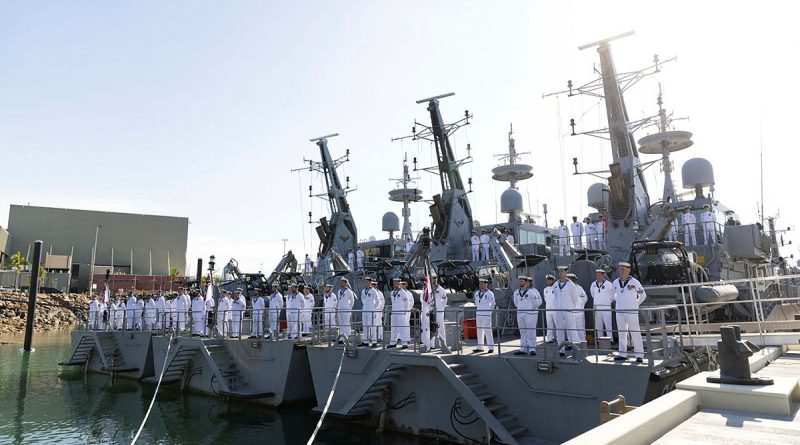 Ship's company of HMA Ships Bathurst, Albany and Childers line the decks during the decommissioning ceremony held at HMAS Coonawarra, in the Northern Territory. Story by Lieutenant Commander Anthony Martin. Photos by Leading Seaman Lauren Pugsley.