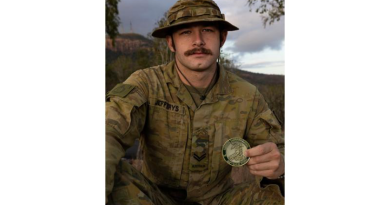 Corporal Tiger Jefferys with his gold medal awarded from Exercise Cambrian Patrol, at Lavarack Barracks, Townsville, In October. Story by Corporal Jacob Joseph. Photo by Lance Corporal Caitlyn Davill.
