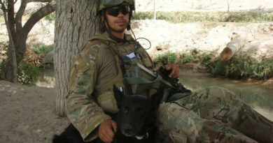 Sapper Ian Moss and former explosive detection dog Florence 'Flo Joe'. Story by Leading Aircraftman Chris Tsakisiris.