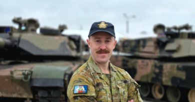 Squadron Leader Chris Dilger in Poland. Story by Lieutenant Commander John A. Thompson. Photo by Lieutenant Commander J. A. Thompson.