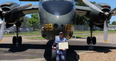 Sergeant David Humphry with his Certificate of Service and gold Air Force service medallion at RAAF Base Townsville, Queensland. Story by Flight Lieutenant Natasha Silver.