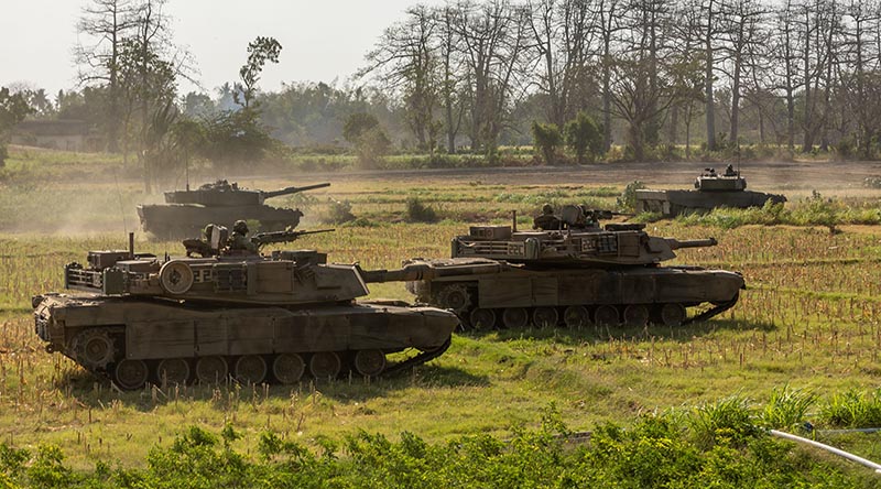 Australian Army soldiers from the 1st Armoured Regiment conduct manoeuvre training on an M1A1 Abrams Main Battle Tank in Puslatpur, Indonesia during Exercise Super Garuda Shield 2023. Photo by Sergeant Jarrod McAneney.