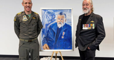Commanding Officer 723 Squadron Commander Joel Cooper and Andy Perry with the Silver Star project painting of Mr Perry. Story by Sub-Lieutenant Dishant Shah. Photos by Leading Seaman Susan Mossop.