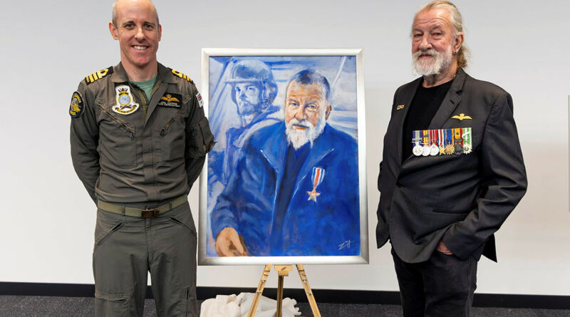 Commanding Officer 723 Squadron Commander Joel Cooper and Andy Perry with the Silver Star project painting of Mr Perry. Story by Sub-Lieutenant Dishant Shah. Photos by Leading Seaman Susan Mossop.