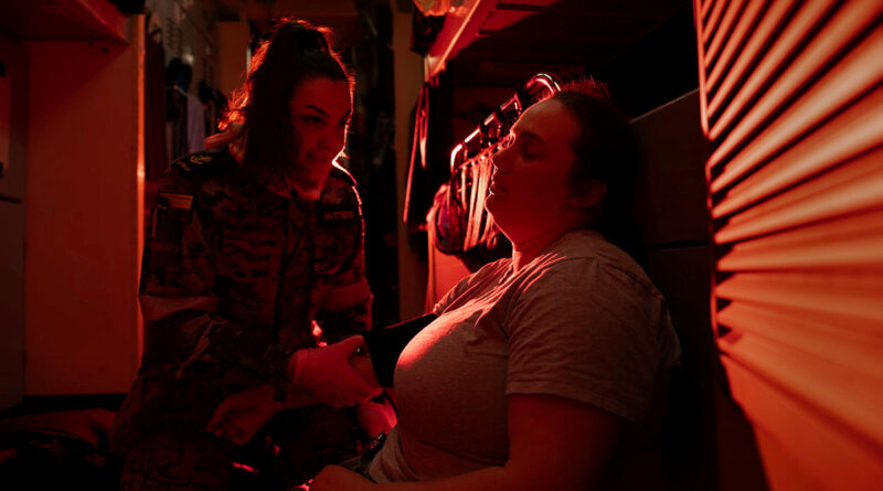Leading Seaman Amy Matthews takes observations of her casualty during a damage-control exercise on board HMAS Toowoomba. Story by Lieutenant Marcus Middleton. Photos by Leading Seaman Zac Dingle.