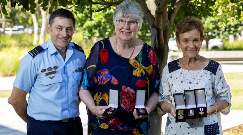 From left, Wing Commander Peter Croce, Anne Burton and Margaret Hilton with the medals awarded to the late Warrant Officer William Kinloch. Photos by Leading Aircraftwoman Nell Bradbury.