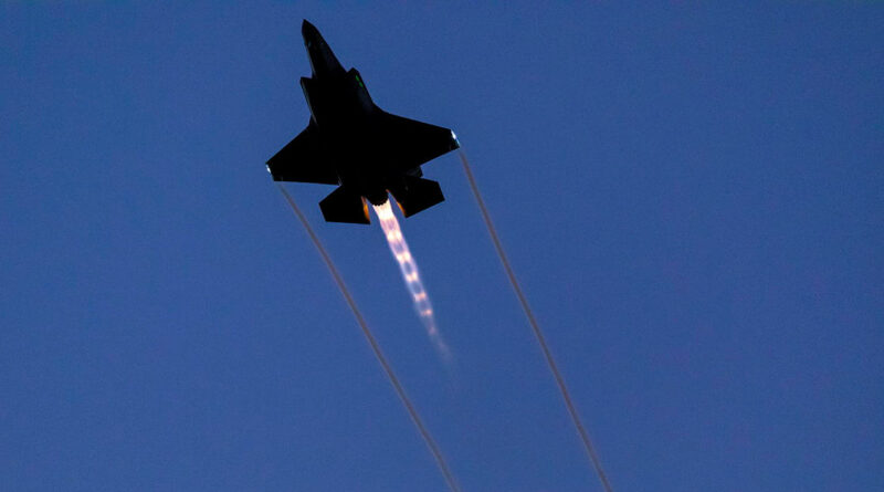 A Royal Australian Air Force F-35A Lightning II during a flying display over Lake Burley Griffin for Canberra's Skyfire 2026. Story by Flying Officer Alexandra DeValentin. Photos by Leading Aircraftman Stewart Gould.
