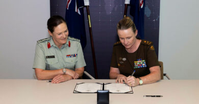 New Zealand’s Brigadier Esther Harrop and Australia’s Lieutenant General Susan Coyle sign the memorandum to boost the two countries’ collaboration in the cyber domain. Story byLieutenant Colonel Andrew Butler.