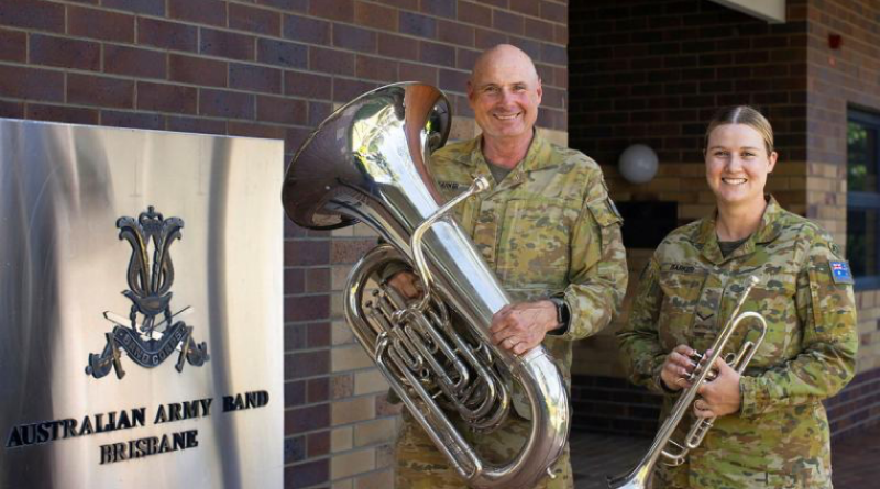 Lance Corporal Imogen Barker and her father, Musician Bill Barker, prepare with the combined military bands of the ADF for their performance with the Royal Edinburgh Military Tattoo in Brisbane. Story by Story and photo by Corporal Julia Whitwell.