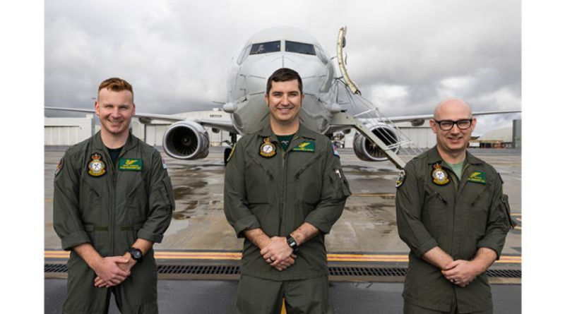 From left, Royal Australian Air Force airborne electronics analysts Corporals Keean Ferguson, Andrew Newton and Joel Letham, of 11 Squadron, in front of a P-8A Poseidon aircraft at RAAF Base Edinburgh, South Australia. Story by Flight Lieutenant Holly Ryan. Photo by Aircraftman Ivan Smotrov.