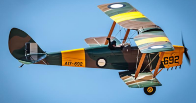 An aviator from 100 Squadron flies a Tiger Moth heritage aircraft. Story by Flying Officer Rose Gigliotti. Photo by Duncan Fenn.