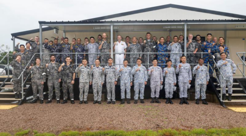 Personnel from the Royal Australian Navy, Vietnam People's Navy, Royal Thai Navy, Philippine Navy, Royal Malaysian Navy and the Indian Navy attend an Exercise Kakadu harbour brief at HMAS Coonawarra, Darwin, NT. Story by Lieutenant Commander Rebecca Williamson. Photo by Seaman Genae Kelly.