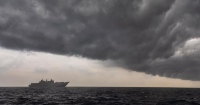 HMAS Adelaide sails into a rain cloud during Indo-Pacific Endeavour 2022. Story by Corporal Luke Bellman. Photo by Leading Seaman Sittichai Sakonpoonpol.