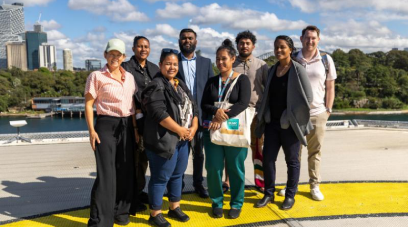 Journalists from Polynesia and Micronesia, along with staff from Australia’s Department of Foreign Affairs and Trade, stand on the helipad of ADV Reliant at Garden Island, NSW. Story by Sub-Lieutenant Jonathan Rendell. Photos by Able Seaman Taylor Johnson.