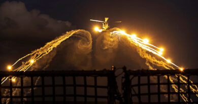 HMAS Warramunga’s embarked MH-60R launches decoy flares during a flying exercise at sea. Story by Sub-Lieutenant Keigan Gunther. Photos by Leading Seaman Abdus Chowdhury.