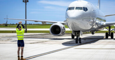 A member of the maintenance crew directs a RAAF P-8A Poseidon post-flight on the apron, at United States Air Force Andersen Air Base, Guam, during Exercise Sea Dragon. Story by Flight Lieutenant Jody Blakeley. Photo by Aircraftman Jakob Reid.
