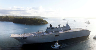 The ship's company of HMAS Canberra lines the upper decks, followed by JS Kumano, FNS Auguste Benebig, HMAS Brisbane and Guardian-class Patrol Boat HMPNGS Francis Agwi as they sail past Bradley's Head for the Exercise Kakadu Fleet Review. Story by Sub-Lieutenant Jonathan Rendell. Photo by Leading Seaman Susan Mossop.