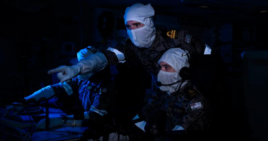 Lieutenant Matthew Jennings conducts anti-submarine warfare exercises with Leading Seaman Lachlan Wyatt aboard HMAS Toowoomba as part of Exercise Nichi Gou Trident. Story by Lieutenant Marcus Middleton. Photo by Leading Seaman Zac Dingle.