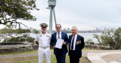 From left, Commander Australian Fleet Rear Admiral Chris Smith, Veterans’ Affairs and Defence Personnel Minister Matt Keogh and the HMAS Sydney Association treasurer stand in front of the Bradleys Head Naval Memorial in Sydney, NSW. Story by Sub-Lieutenant Jonathan Rendell. Photo by Leading Seaman Lauren Pugsley.