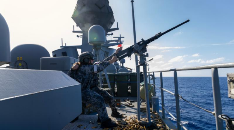 Able Seaman Chloe Lampasona fires the M2HB-QCB at an aerial target on the upper decks of HMAS Toowoomba in the Philippine Sea during a regional presence deployment. Story by Lieutenant Marcus Middleton. Photo by Leading Seaman Zac Dingle.