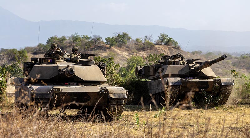 Australian Army soldiers from the 1st Armoured Regiment conduct manoeuvre training on M1A1 Abrams main battle tanks in Puslatpur, Indonesia, during Exercise Super Garuda Shield 2023. Photo by Corporal Dustin Anderson.