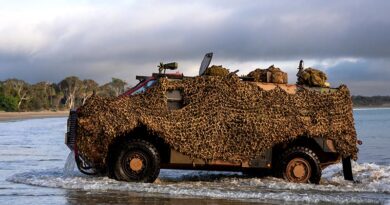 A Bushmaster makes a beach landing during Exercise Talisman Sabre 2025. Photo by Leading Seaman Susan Mossop.