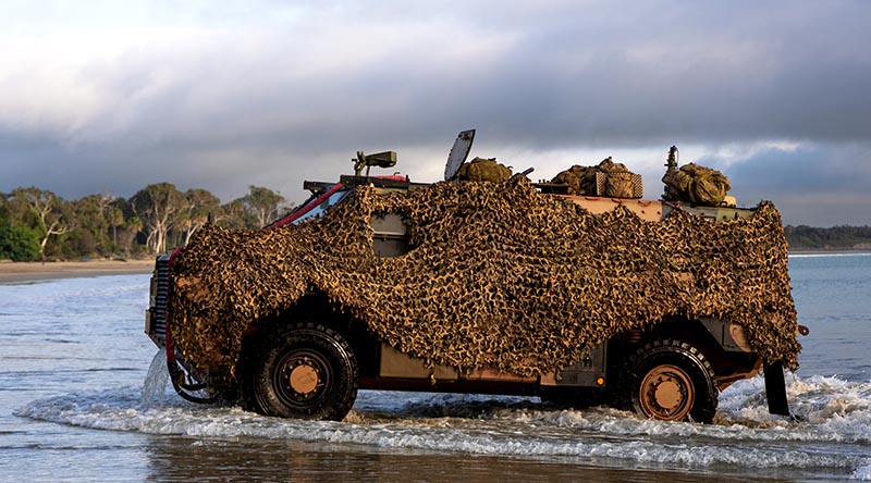A Bushmaster makes a beach landing during Exercise Talisman Sabre 2025. Photo by Leading Seaman Susan Mossop.