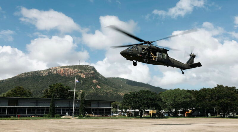 A UH-60M Black Hawk helicopter from the 16th Aviation Brigade conducts integration training with soldiers from the 1st Battalion, Royal Australian Regiment as part of Exercise Valkyrie Crawl. Story by Captain Chloe Ellwood. Photos by Corporal Riley Blennerhassett.