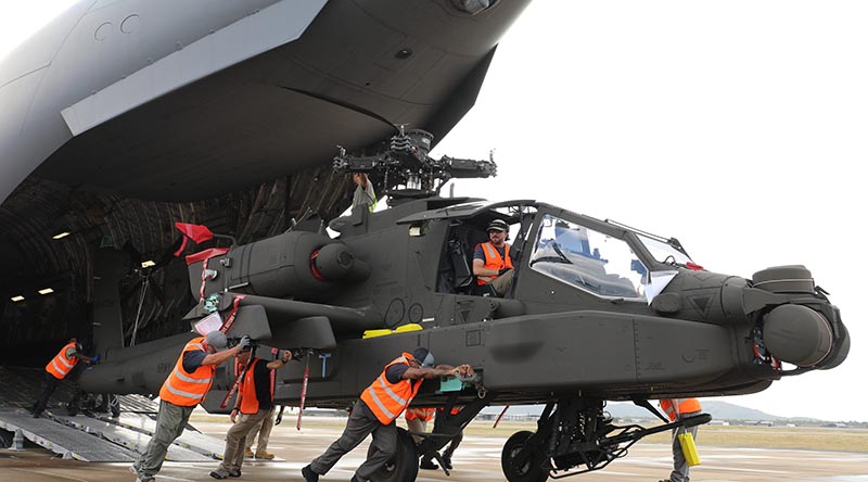 The latest Australian Army AH-64E Apache is offloaded from a RAAF C-17 Globemaster at RAAF Townsville. Photo by Corporal Raiar Cordwell.