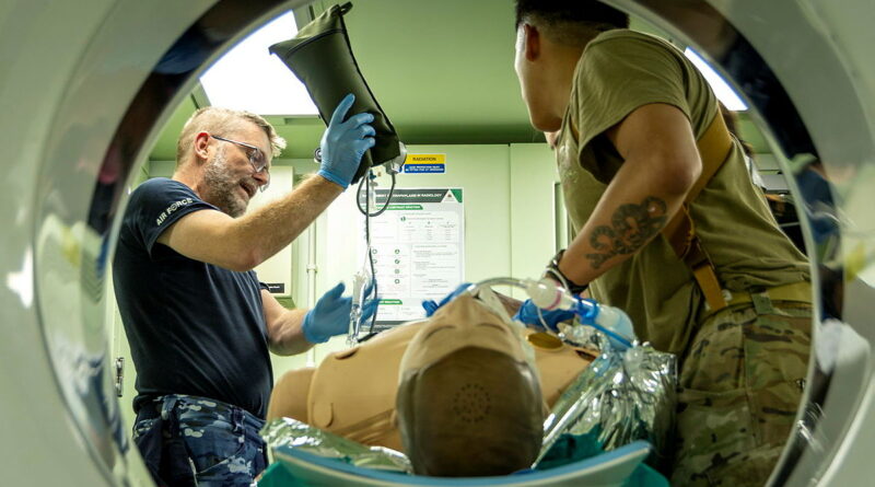 Medical personnel from the 2nd Health Battalion use a deployable CT scanner at a Role 2 Enhanced treatment facility on Exercise Viper Walk at Gallipoli Barracks, Enoggera. Story by Captain Chris Wade. Photo by Private Alli Craig.