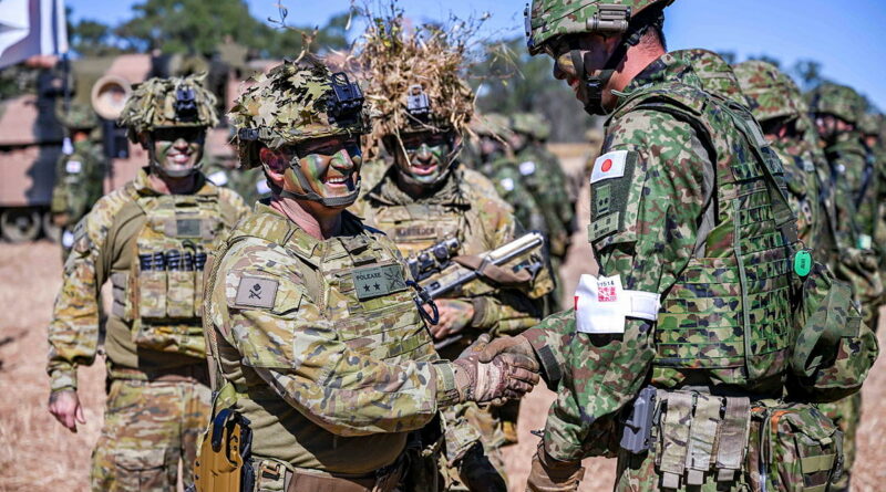 Commander 1st (Australian) Division Major General Ash Collingburn speaks with a Japan Ground Self-Defense Force officer during Exercise Southern Jackaroo at the Townsville Field Training Area. Story by Captain Andrew Page. Photos Linda Bone.