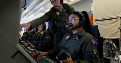 Aircraftman Hardik Sheoran receives instructions from Warrant Officer Michael Bailey, while conducting surveillance in a P-8A Poseidon during Operation Gateway. Story by Flight Lieutenant Natasha Silver. Photos by Leading Aircraftman Campbell Latch.