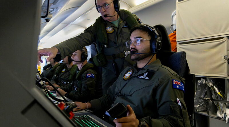 Aircraftman Hardik Sheoran receives instructions from Warrant Officer Michael Bailey, while conducting surveillance in a P-8A Poseidon during Operation Gateway. Story by Flight Lieutenant Natasha Silver. Photos by Leading Aircraftman Campbell Latch.