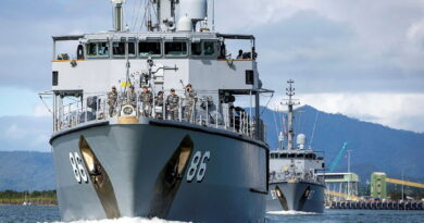 HMAS Diamantina sails ahead of HMAS Yarra as the ships depart Cairns during Operation Render Safe. Story and photo by Captain Jacob Joseph.