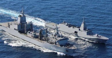 HMAS Supply, foreground, and JS Kumano conduct a replenishment at sea during Anti-Submarine Warfare Exercise. Story by Lieutenant Natalie Starkoff. Photo by Lieutenant Fred Bates.